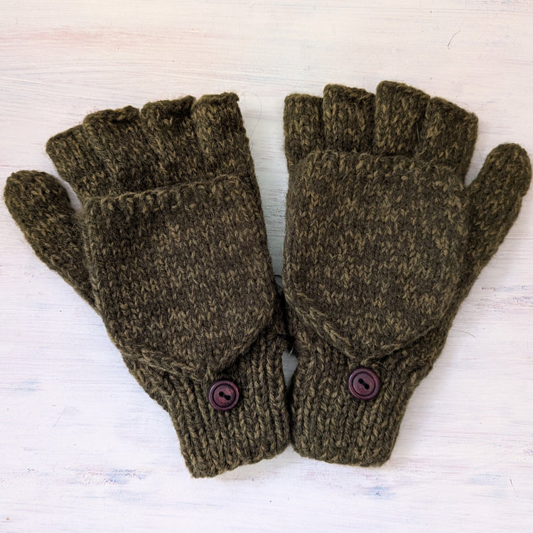 Pair of men's olive green knitted gloves with button closures on a light wooden surface