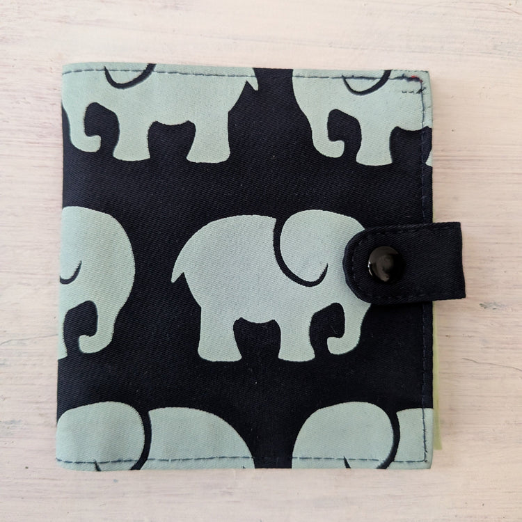 Fabric teal wallet with an elephant pattern
