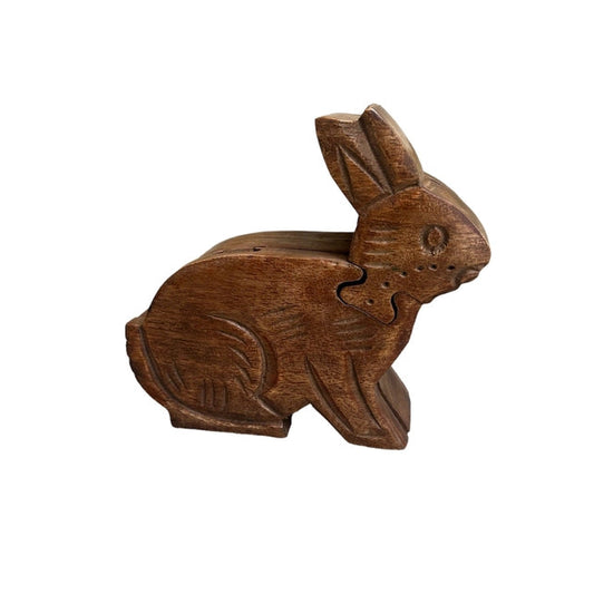 Wooden rabbit puzzle box on a white background