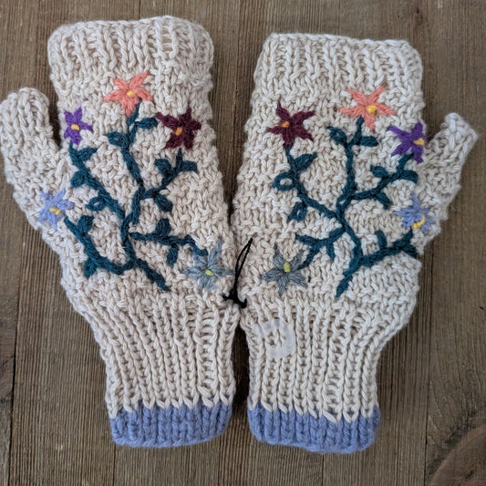 Pair of knitted fingerless gloves with floral patterns 