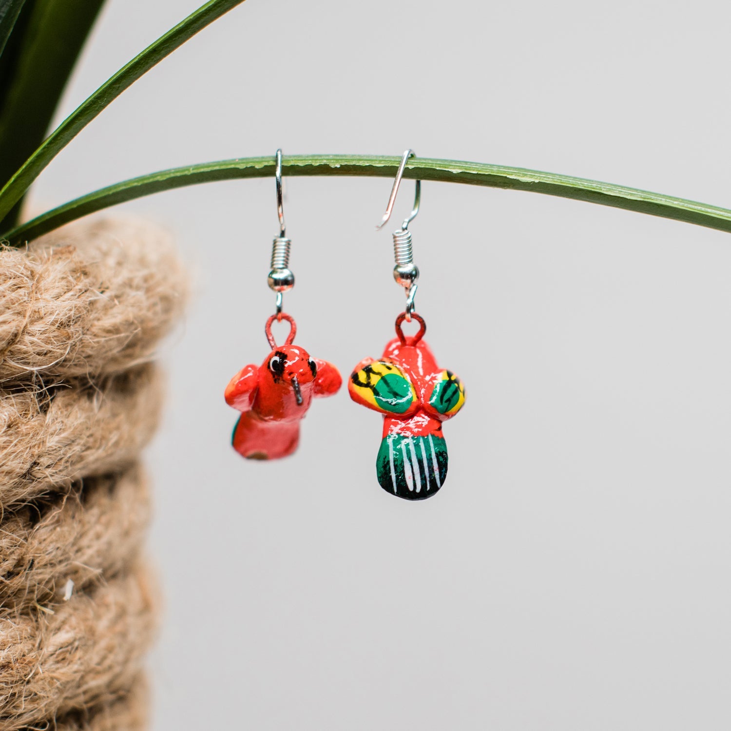 red ceramic hummingbird earrings fair trade handmade guatemalan
