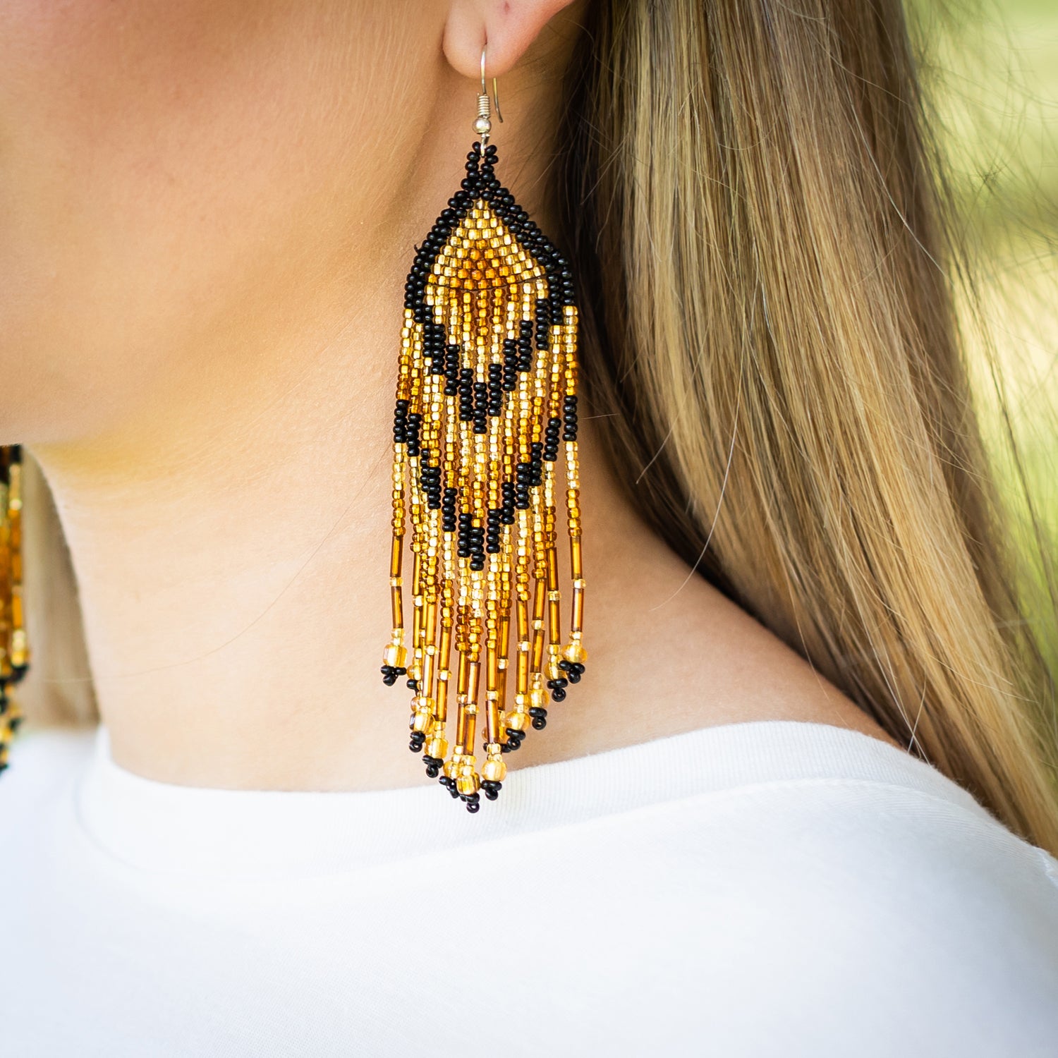 Feather hot sale beaded earrings