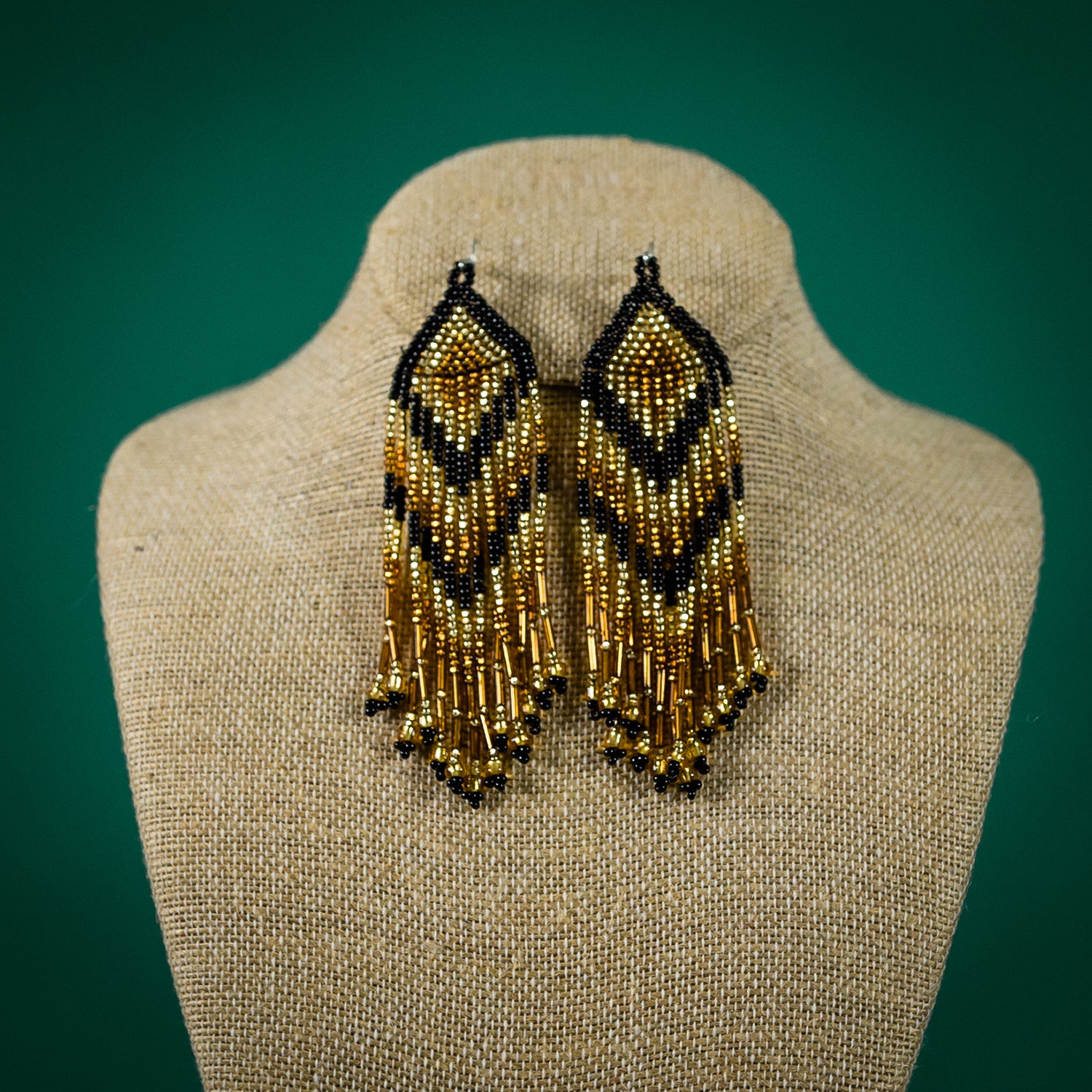 Beaded top feather earrings