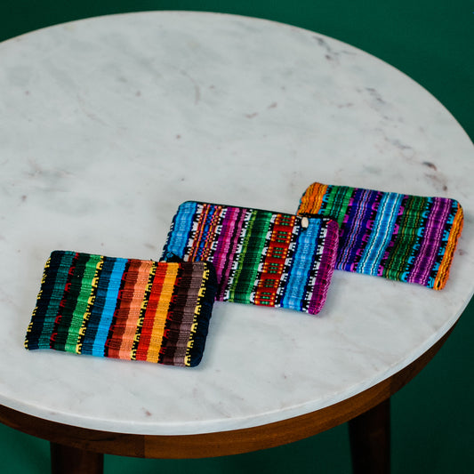 organic cotton rainbow pouches on marble table